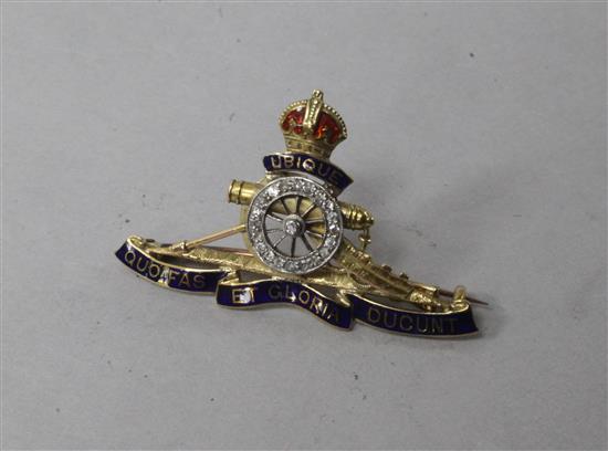 An early 20th century 15ct gold, enamel and diamond set Royal Artillery brooch, 1.5in.